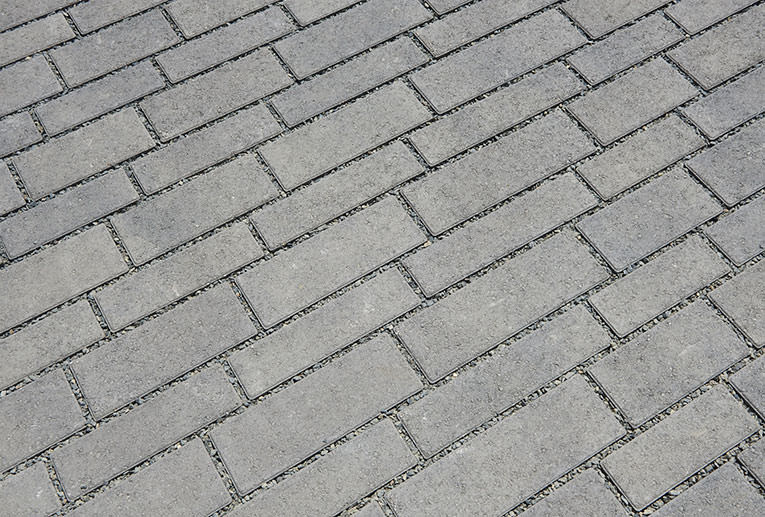 Dark Gray Pewter Charcoal Aqualina Pavers installed in the random runner pattern 