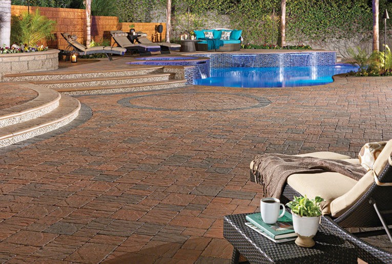 Slate Stone paver pool deck with a circle and border