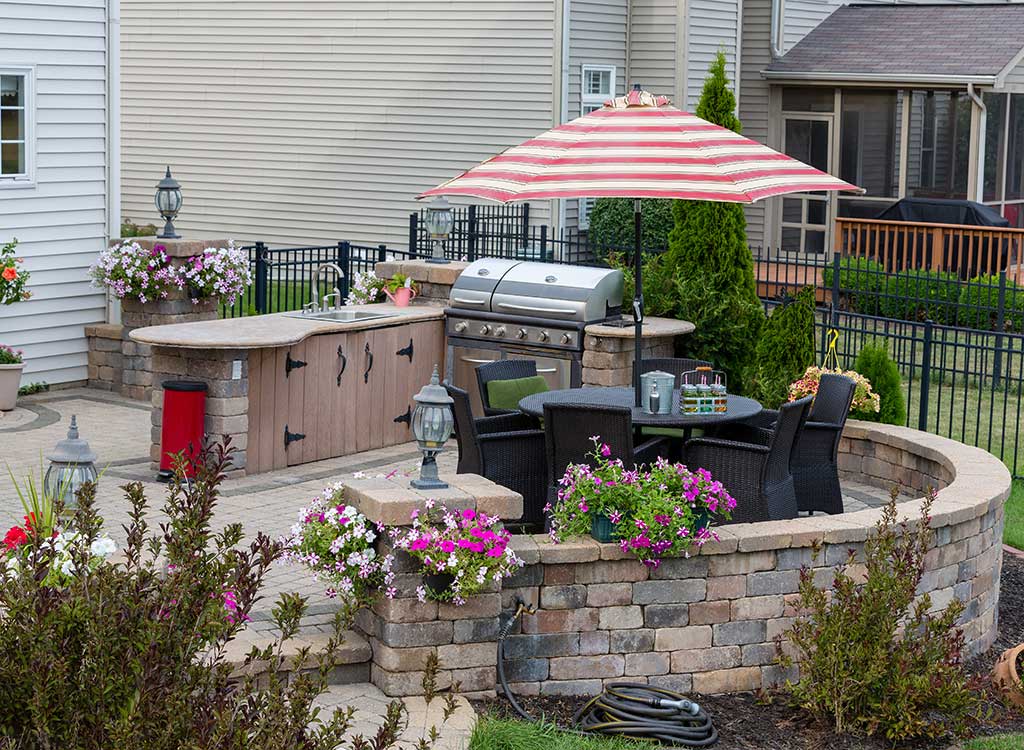A Patio With an Outdoor Kitchen 