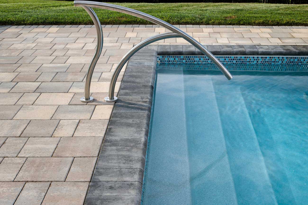 10 Benefits to Choosing Natural Stone Pool Coping